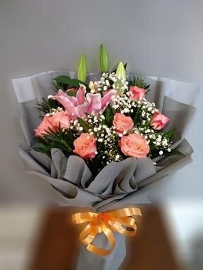 Pink and purple bouquet from Flower Power Bali catalogue