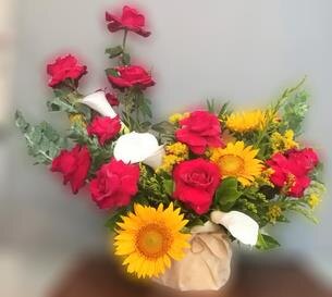Red and yellow tropical arrangement from Flower Power Bali catalogue